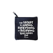 Load image into Gallery viewer, square mini pouches with zipper closures, each featuring a different text quote design in colors black, white, and multicolor. quote says the secret to having everything is believing you do