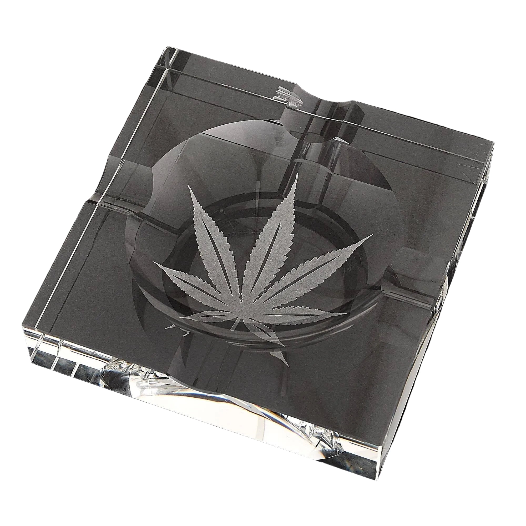 Clear glass cigar ashtray with marijuana leaf design etched in center