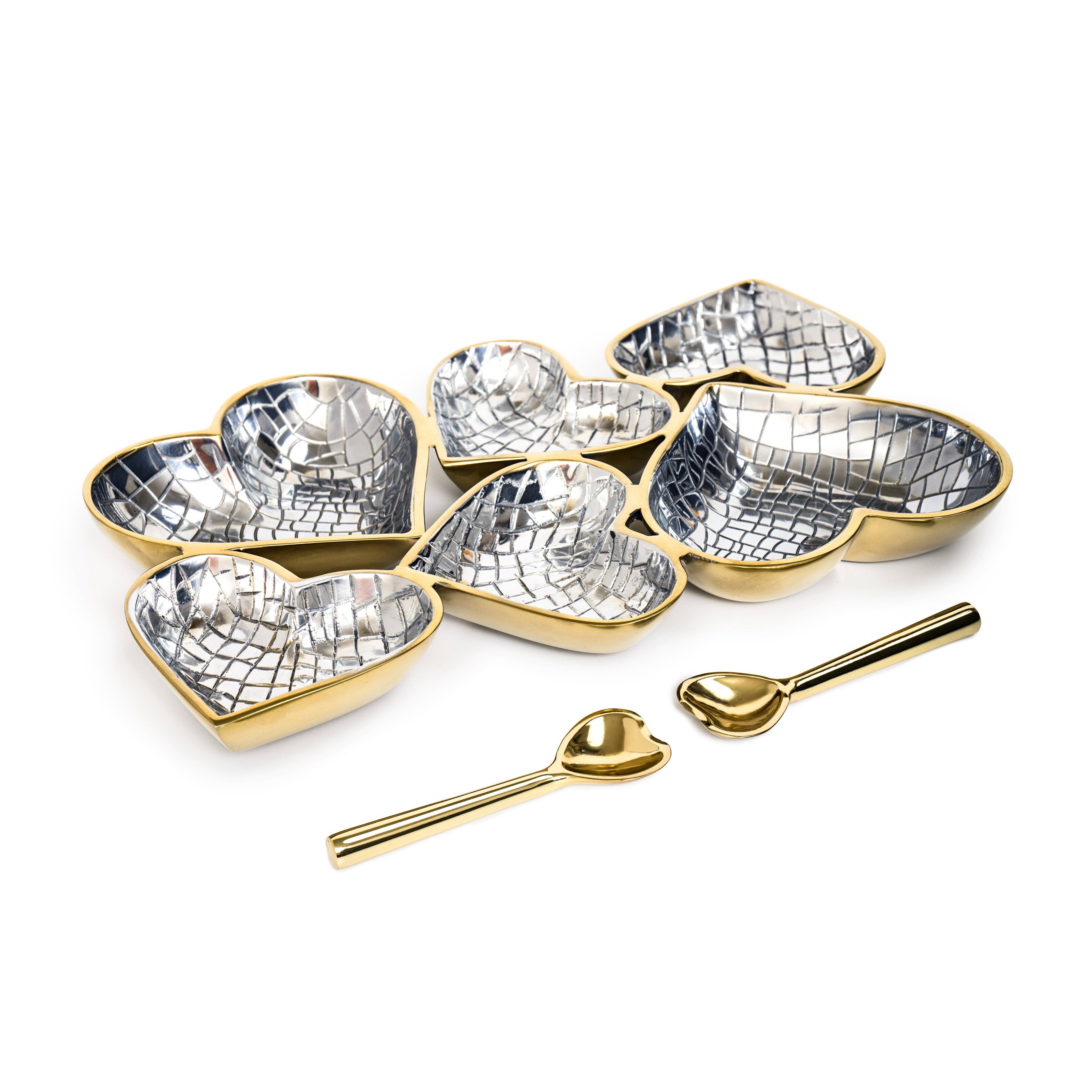 Set of heart-shaped dishes with mosaic patterns and gold edges, accompanied by matching spoons on a white background.