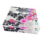 Decorative candy dish with floral and abstract patterns on a white background