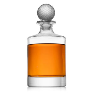 Clear glass decanter with a decorative golf ball stopper to display your favorite whiskey on a bar or kitchen