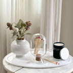 Clear glass matches cloak with matches