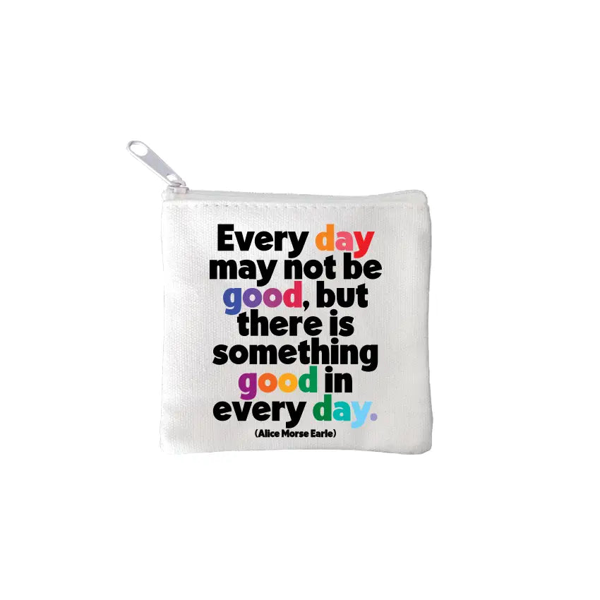 square mini pouches with zipper closures, each featuring a different text quote design in colors black, white, and multicolor. 