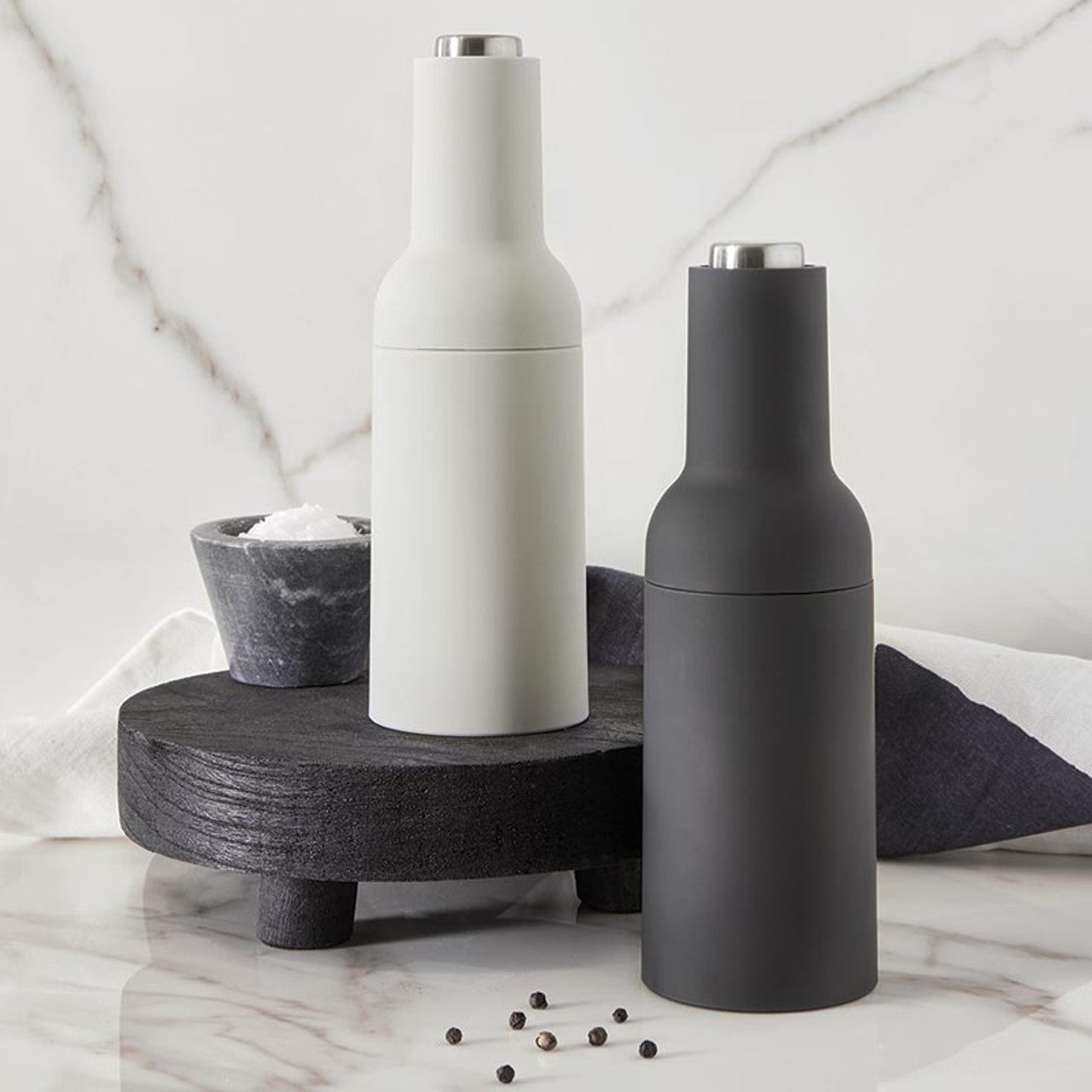 Two electric salt and pepper grinder set, pepper mills, one white and one black