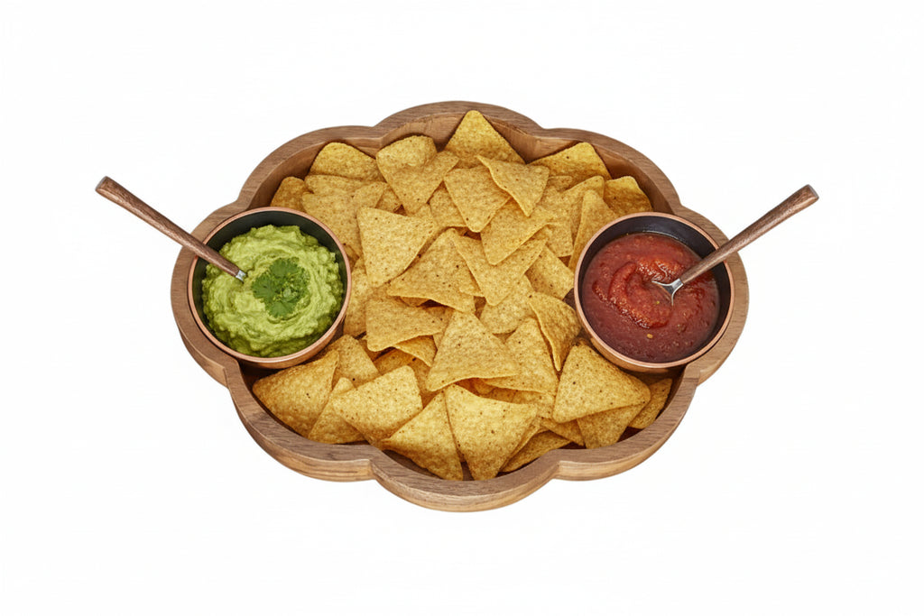 Wooden tray with two silver bowls and wooden spoons on a white background