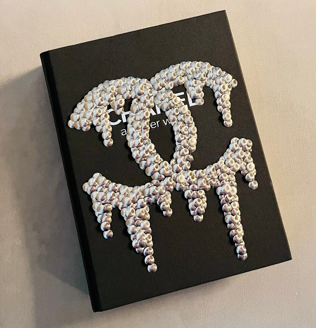 decorative coffee table book adorned with elegant front cover artwork design
