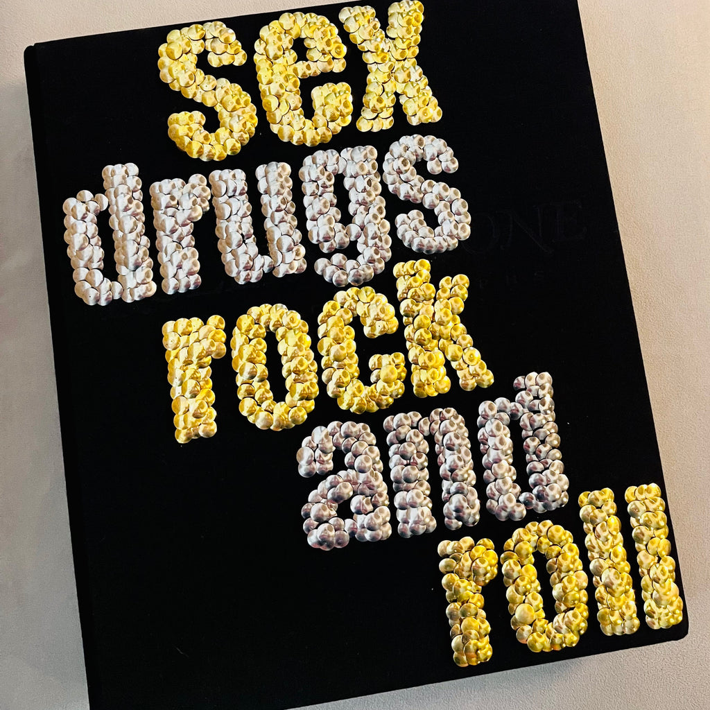 decorative coffee table book adorned with elegant front cover artwork design