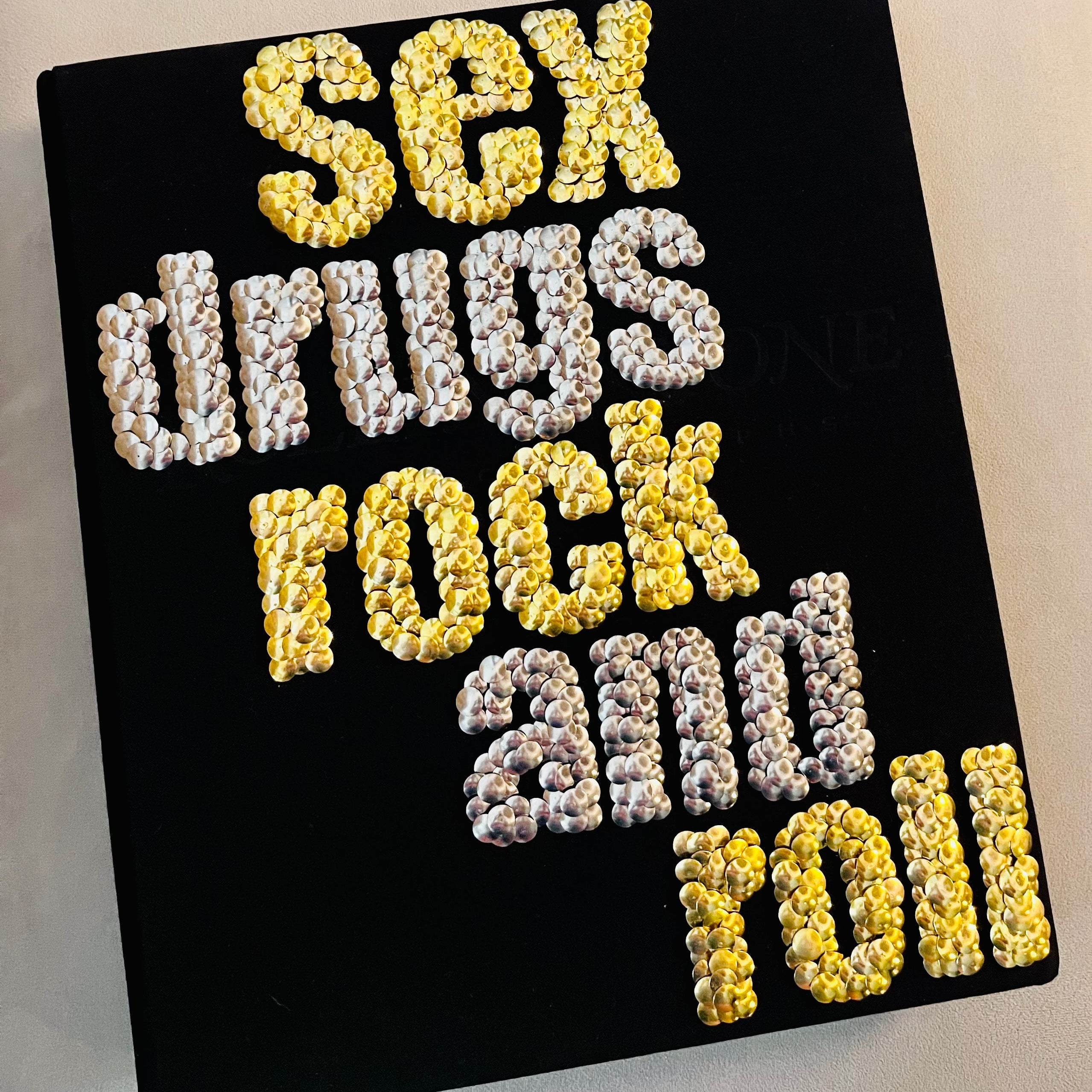 decorative coffee table book adorned with elegant front cover artwork design